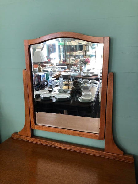 ANTIQUE MIRRORED DRESSER ON CASTERS