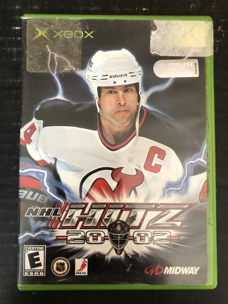 2001 XBOX MIDWAY NHL HITZ 2002 (INCLUDES GAME, BOOKLET, AND ORIGINAL BOX)