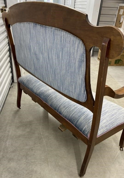 ANTIQUE LOVESEAT SETTEE ON CASTERS